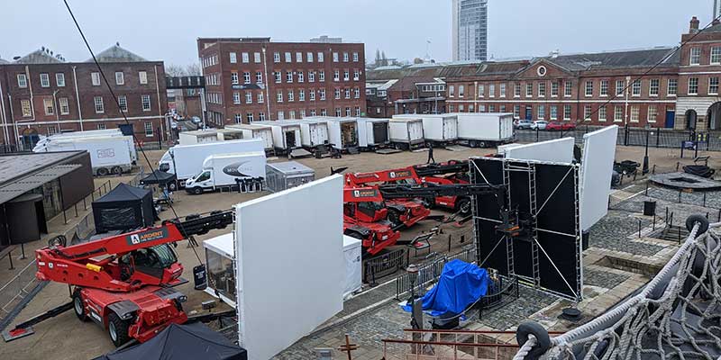 Film production setting up in the arena between the Mary Rose Museum and HMS Victory